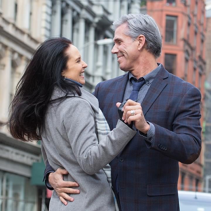 Couple Dancing in City