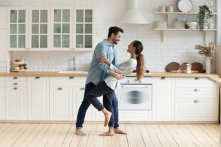 Couple Dancing In Kitchen