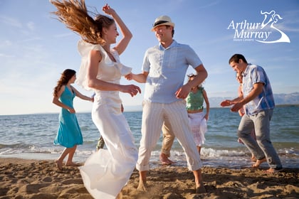 People Dancing on the Beach